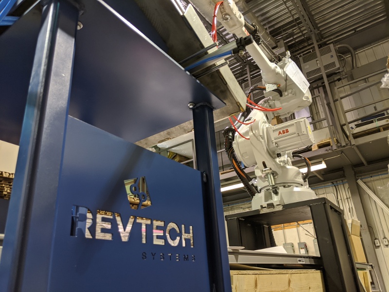 Revtech systems logo on robot Revtech systems logo on robot